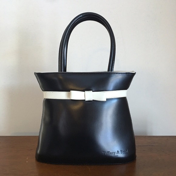 Tiffany & Fred Handbags - Tiffany & Fred Black Leather Cream Bow Wrist Tote